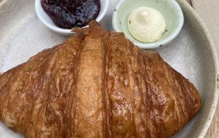 Croissant with jam and fresh Gippsland butter