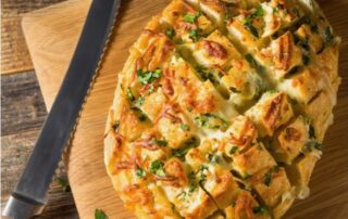 This cheesy garlic damper is a great option to serve with any meal
