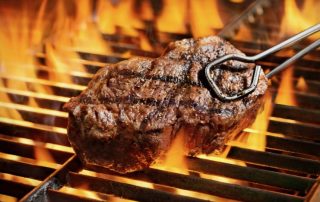 A steak sizzling on the BBQ is just perfect